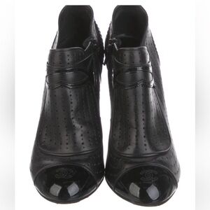 Chanel Authentic actual pic stellar black
booties logo each toe. Size 38. Size 8